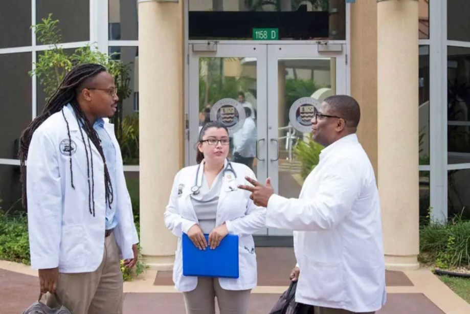 St. Matthew's University School of Medicine Students talking on campus