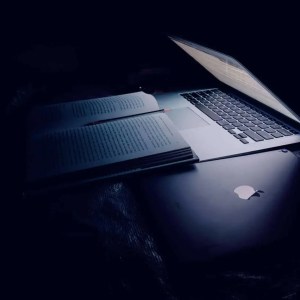 Laptop and textbook