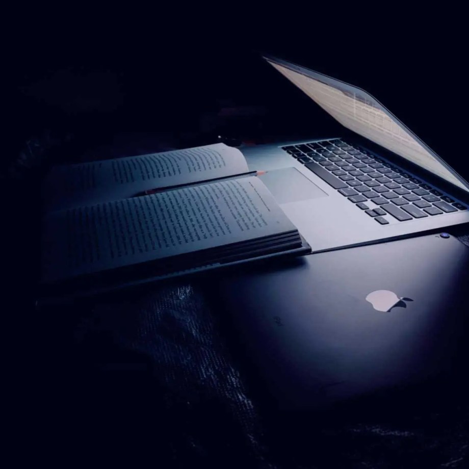 Laptop and textbook