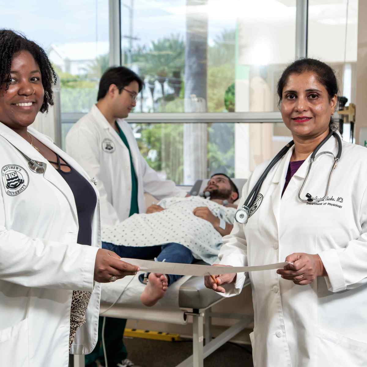 Image of two female medical students in a lab