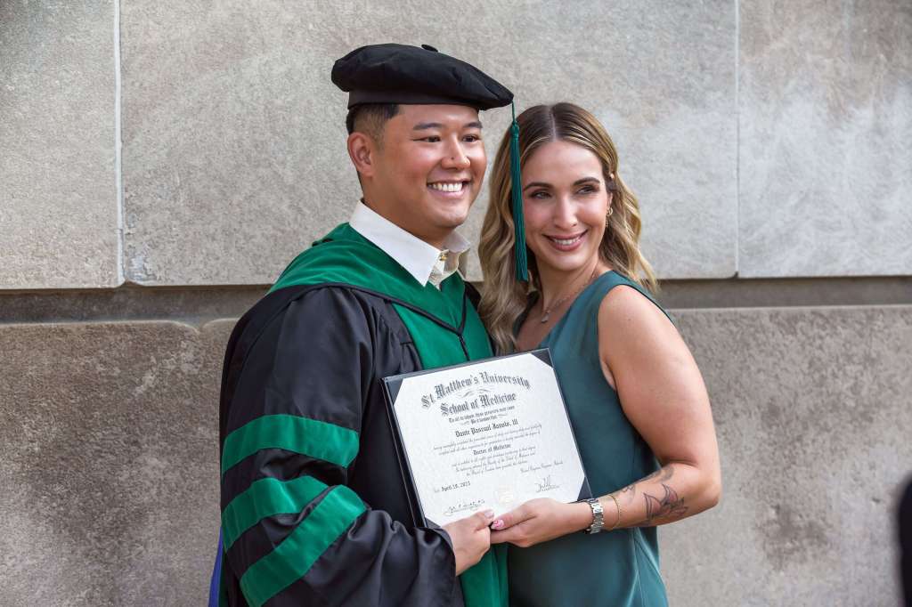 SMU Graduate enjoying commencement with family