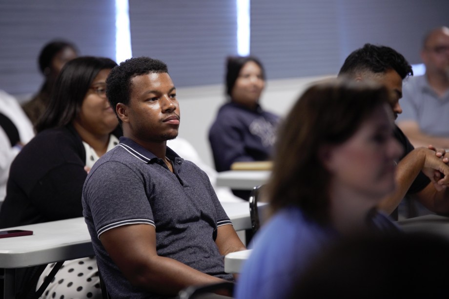 SMU Medical student listening closely to class lecture