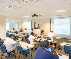 SMU Medical students taking notes during class lecture