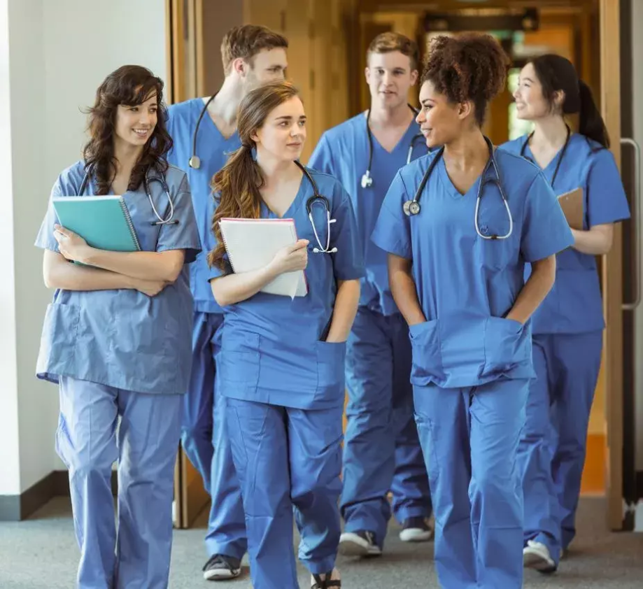 Image of medical students walking in a hallway
